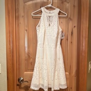 Woman’s white dress. Size 4 By J. Taylor